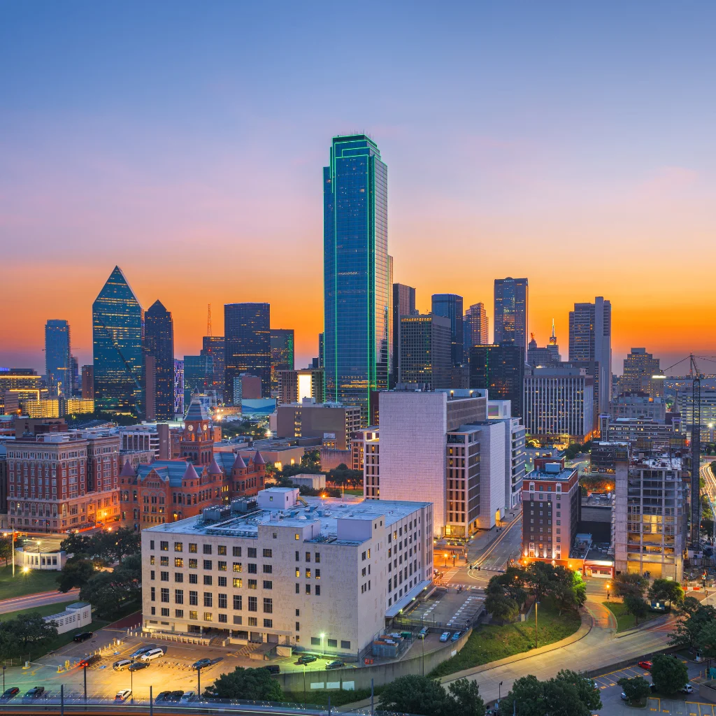 Dallas, texas skyline at sunset with modern skyscrapers and texas city lights. Transportvibe