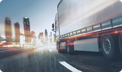 A large blue cargo ship loaded with colorful shipping containers sailing across the open sea with another vessel in the background. Transportvibe 4